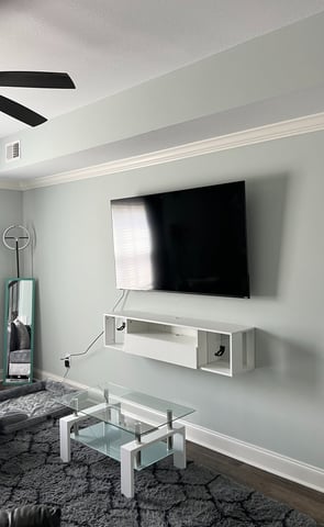 Basic TV install with decorative floating shelf underneath