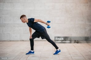 a man doing a triceps exercise