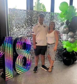 Silver shimmer wall with and 18 marquee number for Jayden's birthday in Eagleby.
