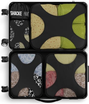 a suitcase with a variety of different types of luggage
