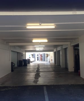 a parking lot with a parking lot and a parking lot