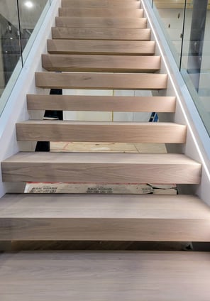 Custom stair treads as part of a premium staircase design, built for style and durability