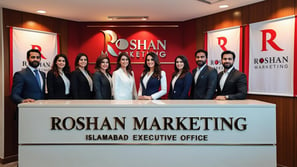 a group of people standing in front of a roshan marketing office