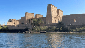 Aswan cityscape showcasing temples, the Nile, and the High Dam.