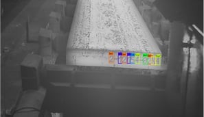 a large metal pipework with a colorful colored squares