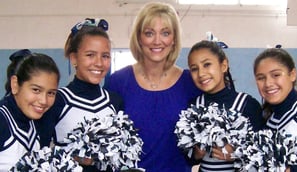 Angie Crouch with high school cheerleaders 