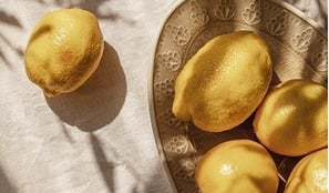 Yellow lemons on a table