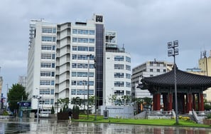 Jeonil Building 245 with the democracy bell in the foreground