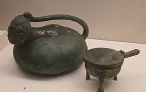 Bronze tripod cauldrons