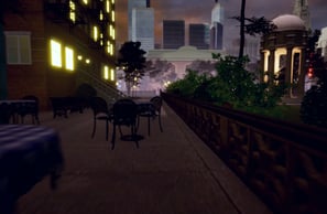 Coded Black gameplay screenshot showing a city at night with a park and tables outside a restaurant. 