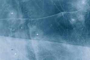 background image - top down view of blue ice cracks