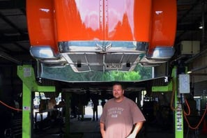 Dad Under Red Truck