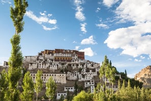 a mountaintop with a view of a town