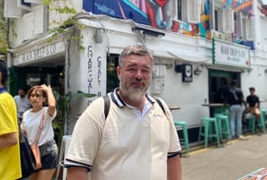 Image of Author: Jason A Ellis traveling the world, local area in Singapore