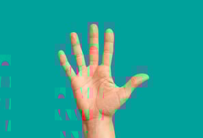 Raised hand showing interest in volunteering