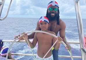 a man and a child on a boat