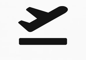 a plane is flying over a sign that says,