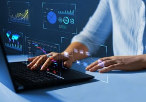 Laptop displaying accounting software dashboard with analytics.