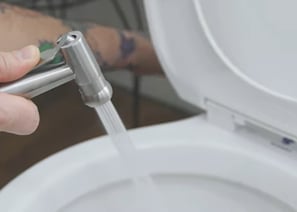 testing a spray bidet attachment