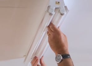 putting a fluorescent lamp in its proper position