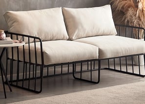 3D marketing design of a modern industrial-style sofa set, vintage charm, inviting indoor elements.