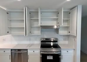 a kitchen with a variety of kitchen cabinets from kitchenrta