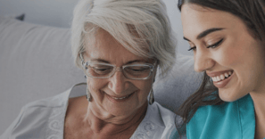 Home care personnel with elderly lady