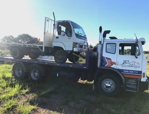 transporting small truck from farm