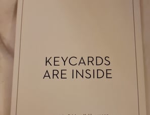 Envelope that says "Keycards are Inside"