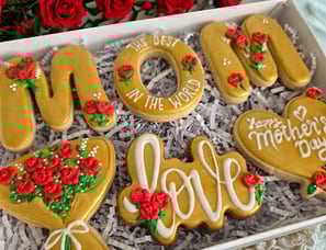 Personalized Mother's Day cookie gift box with elegant gold-themed cookies and red rose decorations, to celebrate love