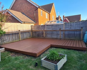 Garden decking with fence behind