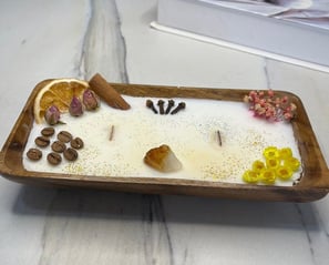 a dessert with a wooden tray with a spoon and a knife