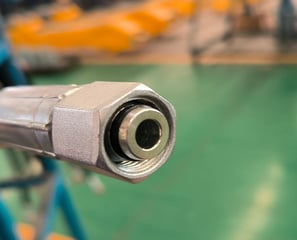 Premium hydraulic connector for log, telescopic, lorry cranes, and forklift jibs. Detail shot.