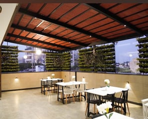 Modern dining room with warm lighting and comfortable seating