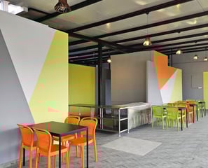 Modern dining room with veg food and comfortable seating