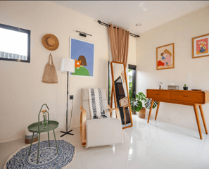 Lounge area with comfortable arm chair at Casa Candali