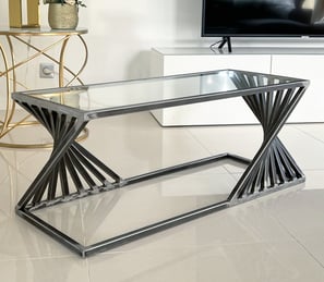 Table basse unique en métal avec effet accordéon plateau verre style industriel