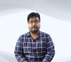 "Expert male tutor from Excellence Home Tuition standing confidently, ready to teach."