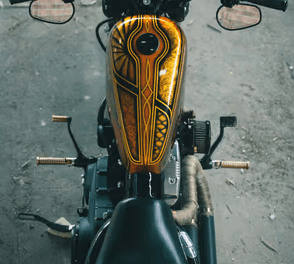 a motorcycle with a wooden handlebars and a wooden handlebar