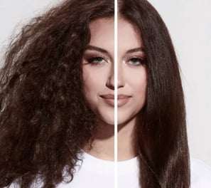 a woman with long hair and a white shirt