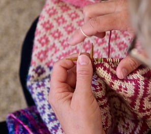 two hands knitting