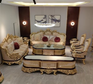 a luxury living room with wood carving couch, wood cariving coffee table and wood carving chairs