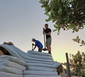 building with superadobe in portugal