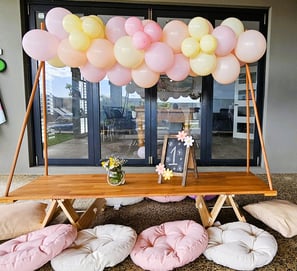 teepee picnic table daisy bloom theme with balloon garland