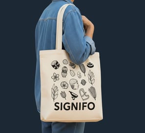 Tas kanvas putih SIGNIFO dengan print custom untuk merchandise.