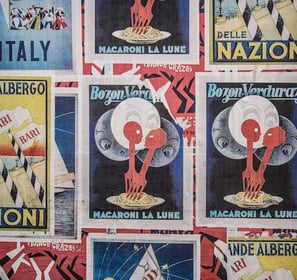 A collage of vintage European posters, featuring vibrant macaroni advertisements and sailing imagery.