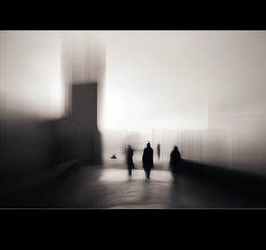a group of people walking down a street