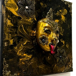 a painting of a gold mask on a white background