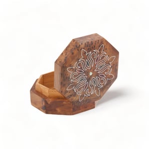 a wooden box with a flower design on it