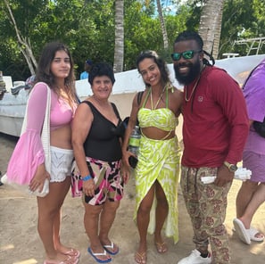 a group of people standing around a group of people